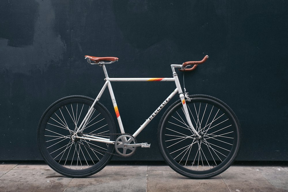 Bicycle against sunset wall